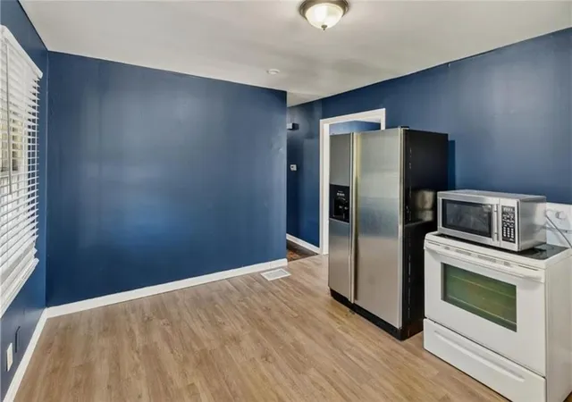 Photo 3 of Multi family home for sale at 1003 1005 W College St, Independence, MO 64050 | MLS# 2638041 | Listing updated on 2026-08-27