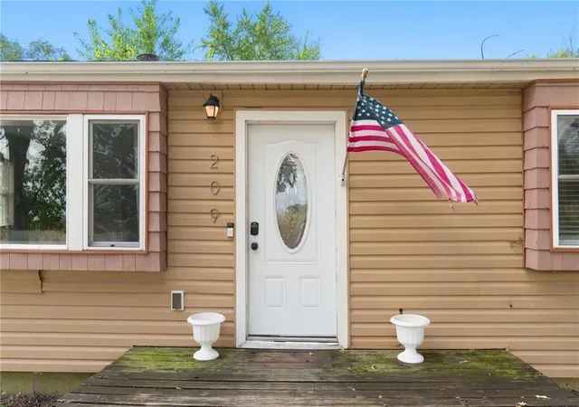 Photo 3 of Single family home for sale at 209 Main St, Bucyrus, KS 66013 | MLS# 2638048 | Listing updated on 2026-09-18