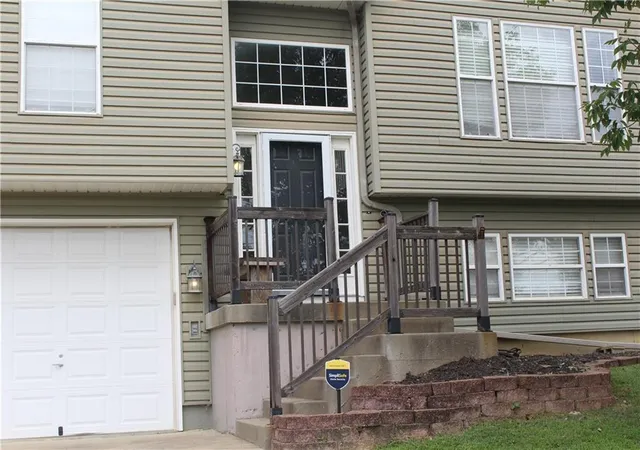 Photo 3 of Single family home for sale at 212 Whispering Hills Blvd, Lone Jack, MO 64070 | MLS# 2638482 | Listing updated on 2026-10-02