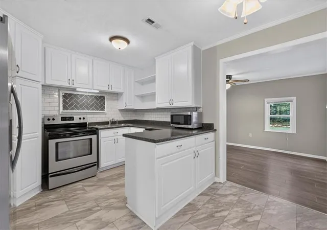 Photo 2 of Single family home for sale at 11501 W 68th St, Shawnee, KS 66203 | MLS# 2638574 | Listing updated on 2026-10-08