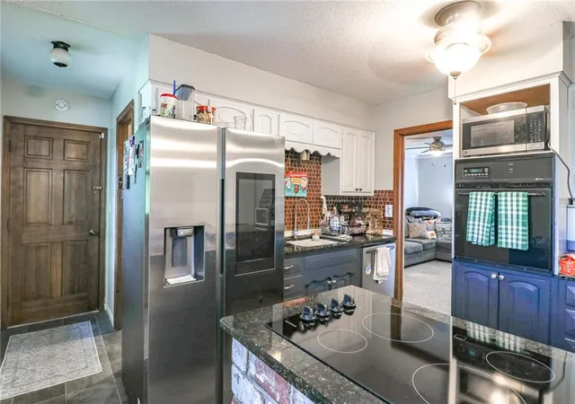 Photo 4 of Single family home for sale at 324 Goodrich Dr, Warrensburg, MO 64093 | MLS# 2639472 | Listing updated on 2026-09-03