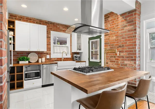Photo 2 of Single family home for sale at 4235 Harrison St, Kansas City, MO 64110 | MLS# 2639496 | Listing updated on 2026-10-19
