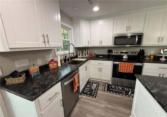 Photo 5 of Single family home for sale at 613 S Whitmer St, Richmond, MO 64085 | MLS# 2639807 | Listing updated on 2026-09-02