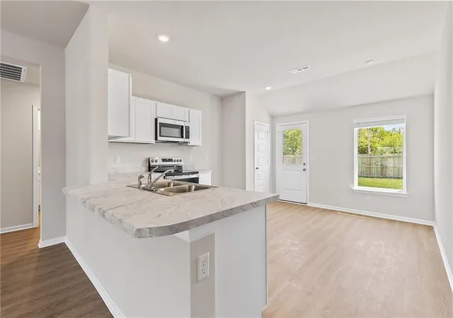 Photo 2 of Single family home for sale at 1602 Sw 10th Terrace, Oak Grove, MO 64075 | MLS# 2640538 | Listing updated on 2026-10-09