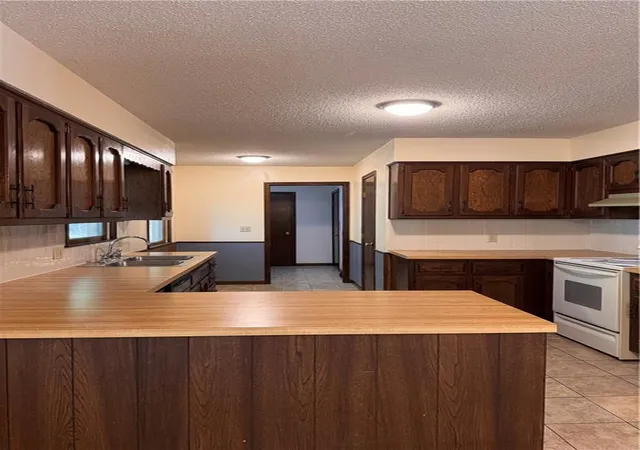 Photo 3 of Single family home for sale at 402 S Delaware St, Archie, MO 64725 | MLS# 2640731 | Listing updated on 2026-09-26