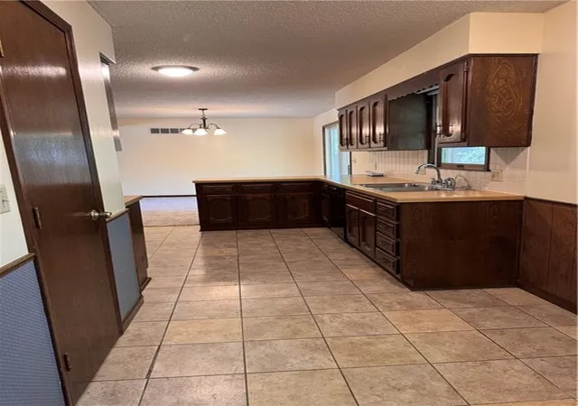 Photo 4 of Single family home for sale at 402 S Delaware St, Archie, MO 64725 | MLS# 2640731 | Listing updated on 2026-09-26
