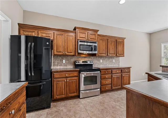Photo 3 of Single family home for sale at 21871 W 116th Place, Olathe, KS 66061 | MLS# 2640845 | Listing updated on 2026-10-08