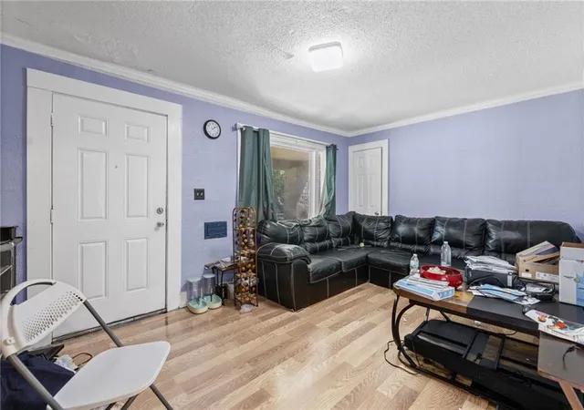 Photo 3 of Single family home for sale at 5734 Olive St, Kansas City, MO 64130 | MLS# 2641021 | Listing updated on 2026-09-12