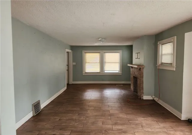 Photo 2 of Single family home for sale at 60 S 18th Street, Kansas City, KS 66102 | MLS# 2641658 | Listing updated on 2026-09-12
