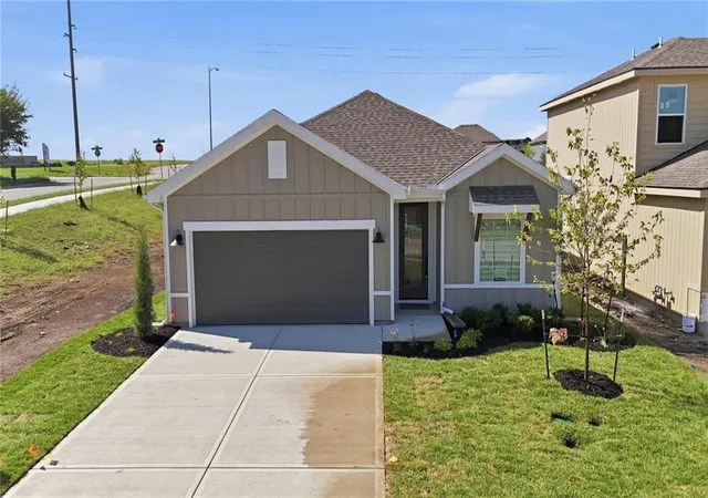 Photo 2 of Single family home for sale at 1301 Saddle Ct, Raymore, MO 64083 | MLS# 2641695 | Listing updated on 2026-10-06