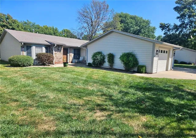Single family home for sale at 1328 W Jenkins Blvd, Raymore, MO 64083 | MLS# 2642038