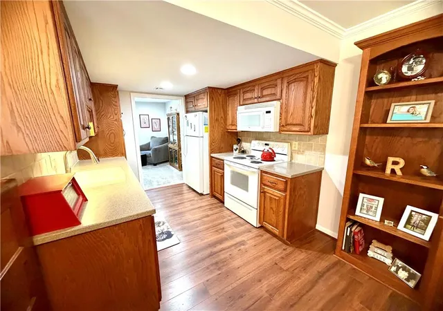 Photo 3 of House for sale at 1328 W Jenkins Blvd, Raymore, MO 64083 | MLS# 2642038 | Listing updated on 2026-09-16
