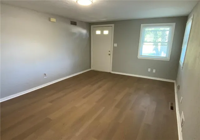 Photo 2 of Single family home for sale at 1053 Locust St, Kansas City, KS 66103 | MLS# 2642084 | Listing updated on 2026-09-23