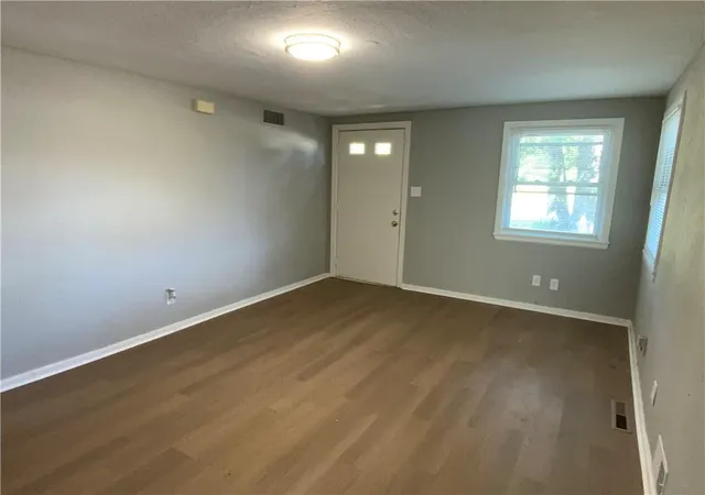 Photo 3 of Single family home for sale at 1053 Locust St, Kansas City, KS 66103 | MLS# 2642084 | Listing updated on 2026-09-23