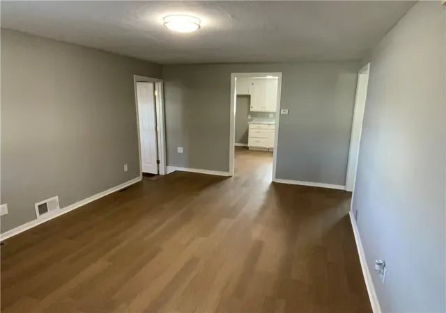 Photo 4 of Single family home for sale at 1053 Locust St, Kansas City, KS 66103 | MLS# 2642084 | Listing updated on 2026-09-23