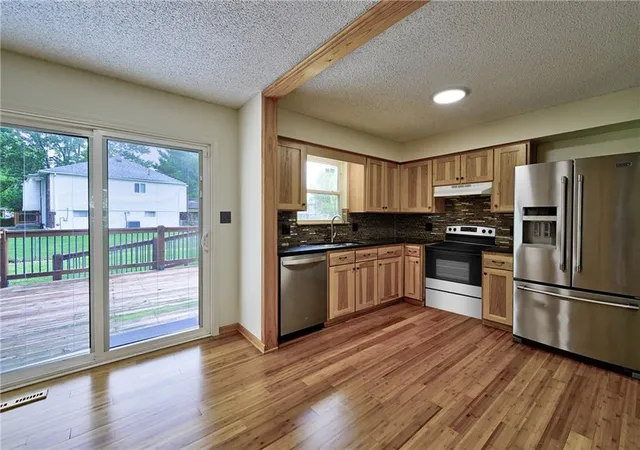 Photo 4 of Single family home for sale at 5113 NW Downing St, Blue Springs, MO 64015 | MLS# 2642139 | Listing updated on 2026-09-19