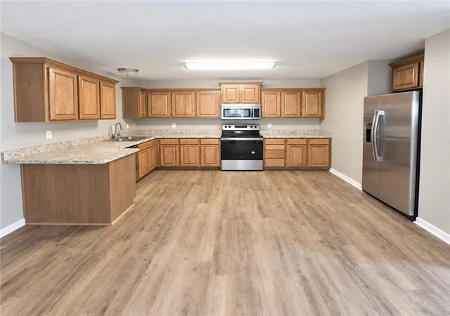Listing Photo 4 - Condo for sale in building located at 899 W Gay St, Warrensburg, MO 64157