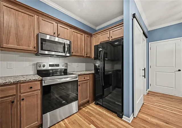 Photo 3 of Townhouse for sale at 2118 NE 107th Terrace, Kansas City, MO 64155 | MLS# 2642679 | Listing updated on 2026-10-06