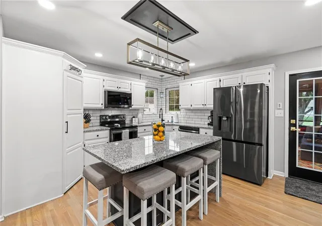 Photo 4 of Single family home for sale at 405 SE Saratoga Dr, Blue Springs, MO 64014 | MLS# 2642839 | Listing updated on 2026-10-03