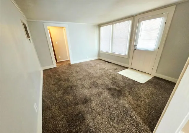 Photo 2 of Single family home for sale at 305 E Jackson St, Pittsburg, KS 66762 | MLS# 2642877 | Listing updated on 2026-09-21