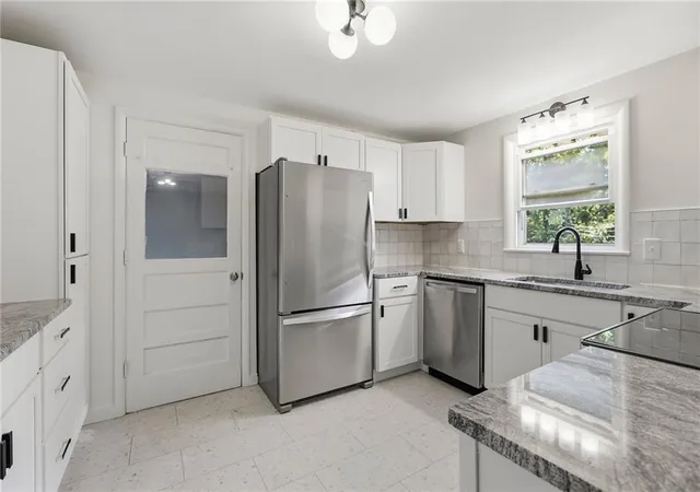 Photo 3 of Single family home for sale at 5909 Melrose Ln, Shawnee, KS 66203 | MLS# 2643093 | Listing updated on 2026-10-09