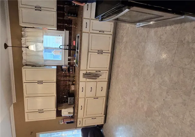 Photo 3 of Single family home for sale at 485 Donnelly Ave, Kansas City, MO 64125 | MLS# 2643128 | Listing updated on 2026-09-25