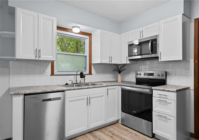 Photo 3 of Sale Pending at 126 Se Moore St, Blue Springs, MO 64014 | MLS# 2643454 | Listing updated on 2026-09-28