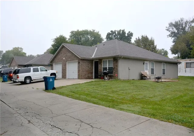 Photo 1 of Multi family home for sale at 305 07 09 Mason St E, Odessa, MO 64076 | MLS# 2643536 | Listing updated on 2026-09-25