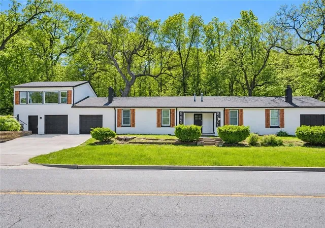 Photo 1 of Multi family home for sale at 8850 Woodland Dr, Lenexa, KS 66220 | MLS# 2643557 | Listing updated on 2026-09-26