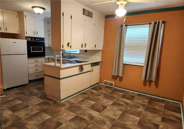 Photo 4 of Sale Pending at 7024 Hunter Rd, Raytown, MO 64133 | MLS# 2643609 | Listing updated on 2026-10-05