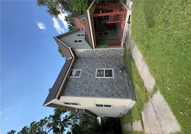 Photo 3 of Single family home for sale at 4030 Woodland Ave, Kansas City, MO 64110 | MLS# 2643744 | Listing updated on 2026-09-30