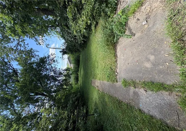 Photo 4 of Single family home for sale at 4030 Woodland Ave, Kansas City, MO 64110 | MLS# 2643744 | Listing updated on 2026-09-30