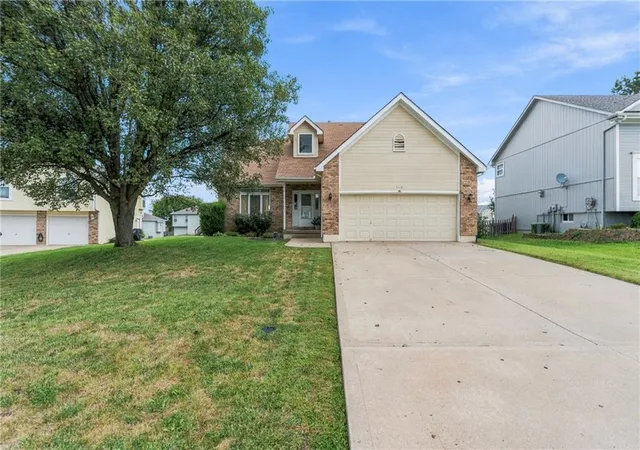 Photo 1 of Sale Pending at 1112 Camelot Dr, Raymore, MO 64083 | MLS# 2643747 | Listing updated on 2026-09-27