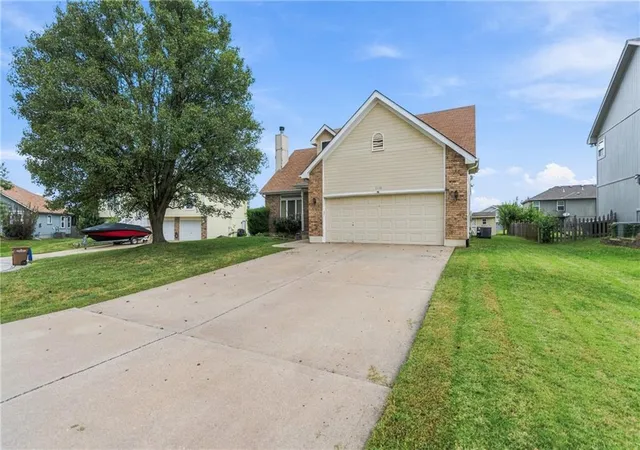 Photo 2 of Sale Pending at 1112 Camelot Dr, Raymore, MO 64083 | MLS# 2643747 | Listing updated on 2026-09-27