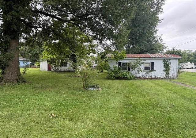 Photo 1 of Single family home for sale at 813 Elm St, Henrietta, MO 64036 | MLS# 2644145 | Listing updated on 2026-09-26