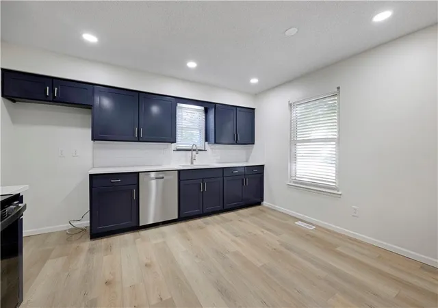 Photo 4 of Single family home for sale at 1107 N Cooper St, Olathe, KS 66061 | MLS# 2644368 | Listing updated on 2026-10-08