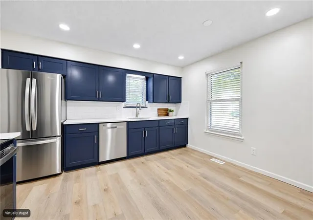 Photo 3 of Single family home for sale at 1107 N Cooper St, Olathe, KS 66061 | MLS# 2644368 | Listing updated on 2026-10-08