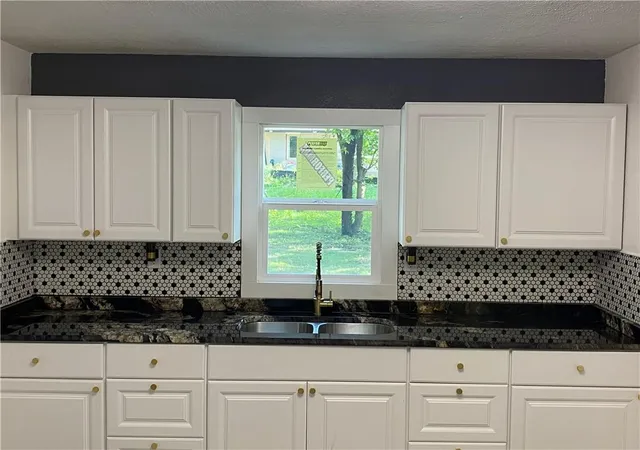 Photo 4 of Single family home for sale at 1229 S Crisp St, Independence, MO 64052 | MLS# 2644378 | Listing updated on 2026-09-28