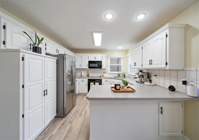 Photo 3 of Single family home for sale at 7418 N Sycamore Ave, Kansas City, MO 64158 | MLS# 2644390 | Listing updated on 2026-10-08