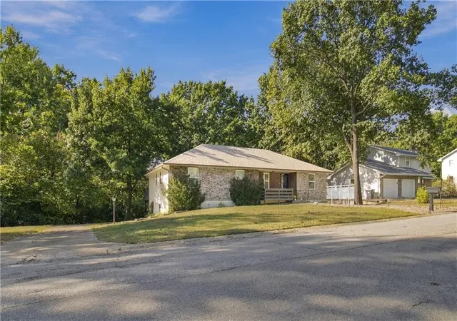 Photo 3 of Sale Pending at 1409 Woodlawn Dr, Warrensburg, MO 64093 | MLS# 2644455 | Listing updated on 2026-10-16