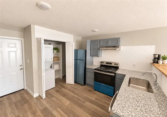 Photo 3 of Multi family home for sale at 1306 Sw Harrison St, Topeka, KS 66612 | MLS# 2644657 | Listing updated on 2026-10-07