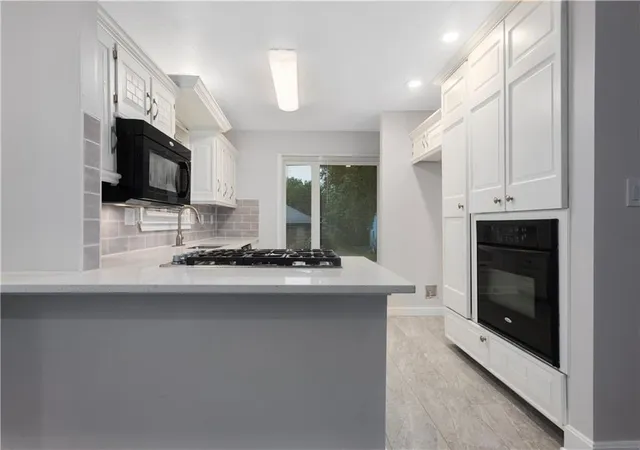 Photo 4 of Single family home for sale at 12816 Winchester Ave, Grandview, MO 64030 | MLS# 2644691 | Listing updated on 2026-10-05