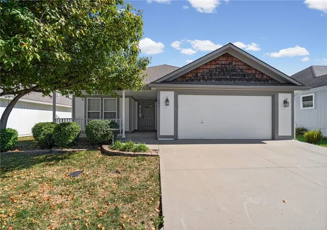 Single family home for sale at 521 Galaxy Ln, Raymore, MO 64083 | MLS# 2645211