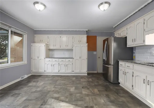 Photo 3 of Single family home for sale at 13248 Manchester Ave, Grandview, MO 64030 | MLS# 2645468 | Listing updated on 2026-10-08