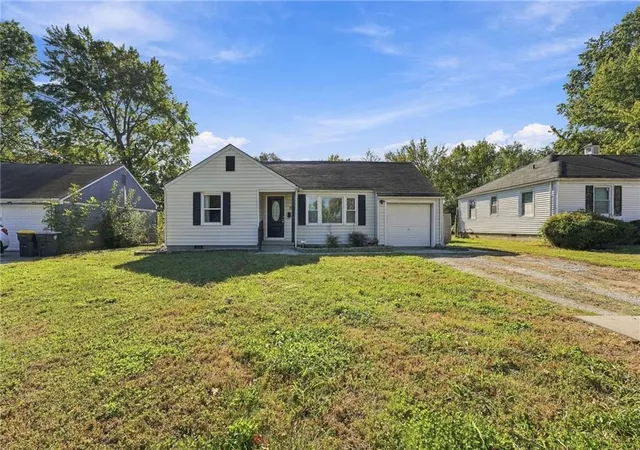 Single family home for sale at 7715 Sni A Bar Rd, Kansas City, MO 64129 | MLS# 2645580