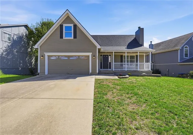 Single family home for sale at 205 N Highland Dr, Raymore, MO 64083 | MLS# 2645614