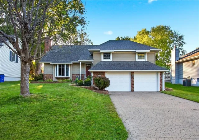 Photo 1 of Single family home for sale at 13929 S Summertree Ln, Olathe, KS 66062 | MLS# 2645629 | Listing updated on 2026-10-08
