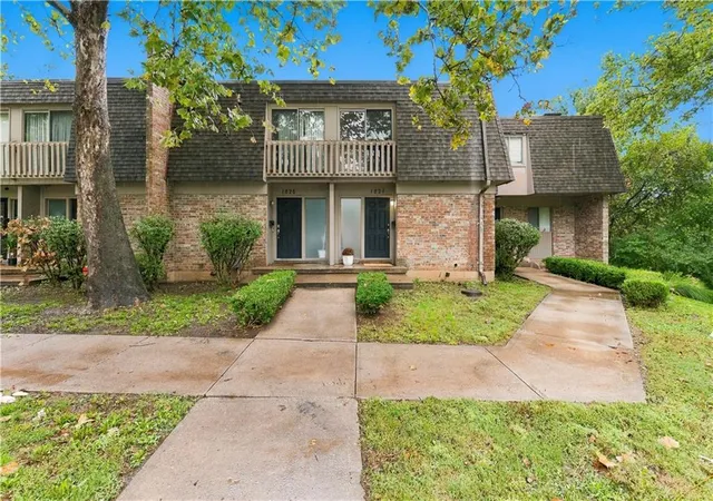 Photo 1 of Townhouse for sale at 1824 E 97th Street, Kansas City, MO 64131 | MLS# 2645777 | Listing updated on 2026-10-07