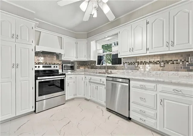 Photo 4 of Single family home for sale at 12004 E 48th Street S, Kansas City, MO 64133 | MLS# 2646094 | Listing updated on 2026-10-09