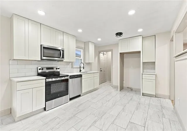 Photo 3 of Single family home for sale at 4411 Springfield St, Kansas City, KS 66103 | MLS# 2646187 | Listing updated on 2026-10-09
